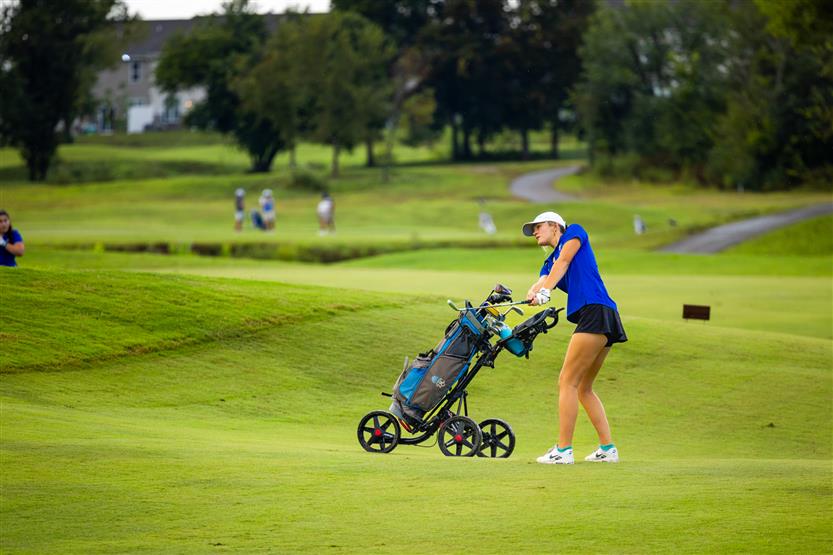 Students play golf